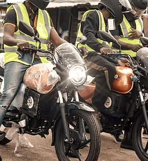 Electric bike riders in high-visibility safety gear